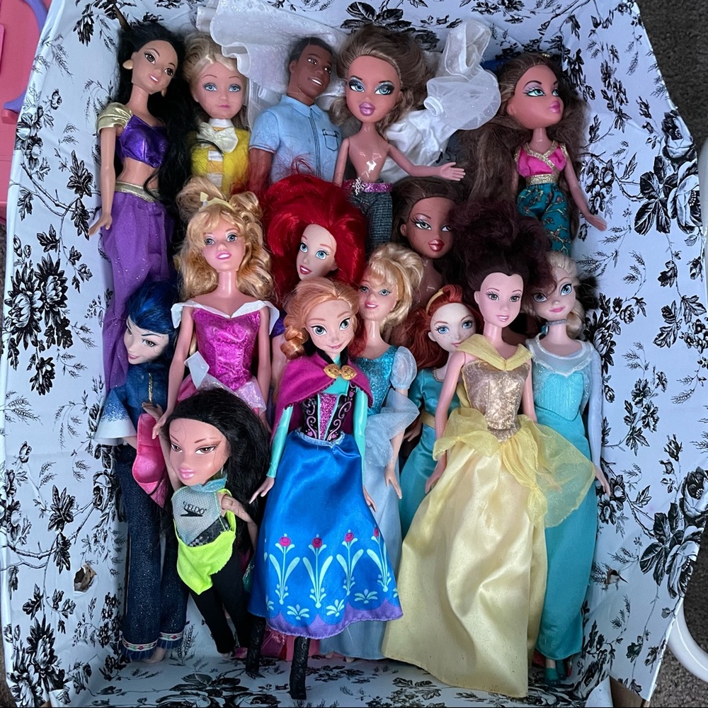 Lot of 16 Dolls Disney plus more.